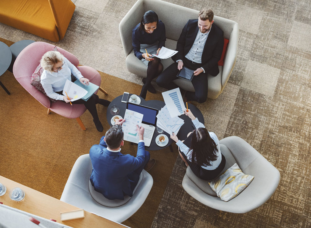 Group of business people in office cafeteria
