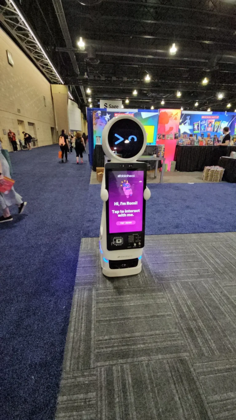 Romi, Bibliotheca’s beta-phase robot, invites interaction from ALA 2025 attendees with touchscreen prompt