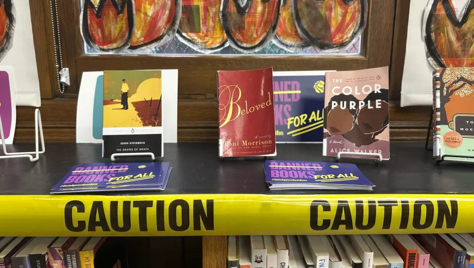 Banned Books Week display at the Mott Haven branch of the New York Public Library featuring challenged titles.