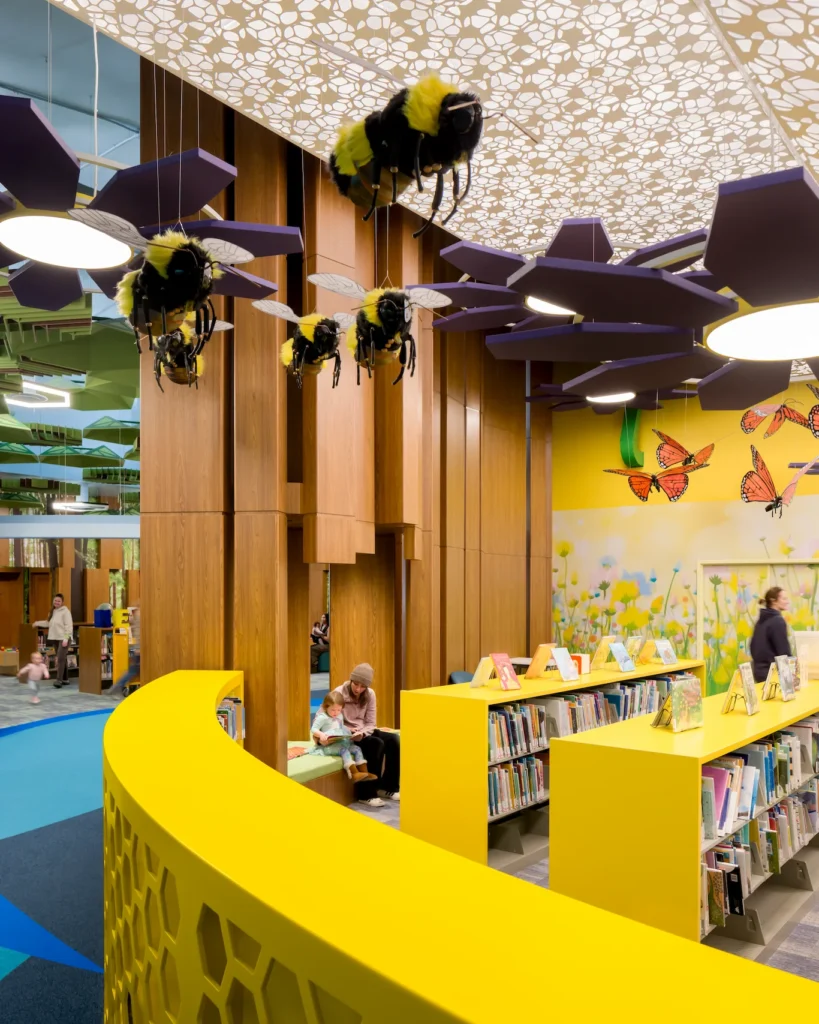Children's library area with bee and butterfly decor at Redford Township District Library.
